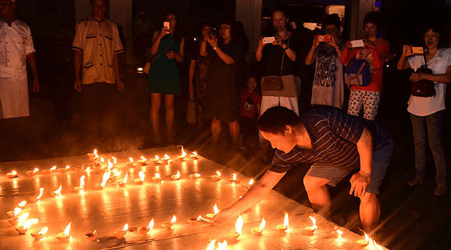 Lighting Candles during the Earth Hour at Mahaweli Reach Hotel